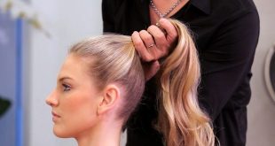 كانتاس الأسترالية تلزم المضيفات بربط الشعر كعكة أو ذيل حصان وارتداء نظارات