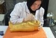 مصر تخلّد فعالية افتتاح المتحف الكبير بدعوة مستوحاة من تابوت الملك الذهبي